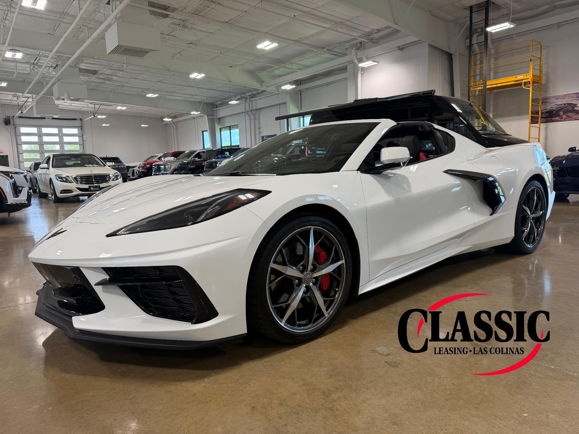 2021 Chevrolet Corvette Stingray Coupe 2LT Z51 in Arctic White — front three-quarter view
