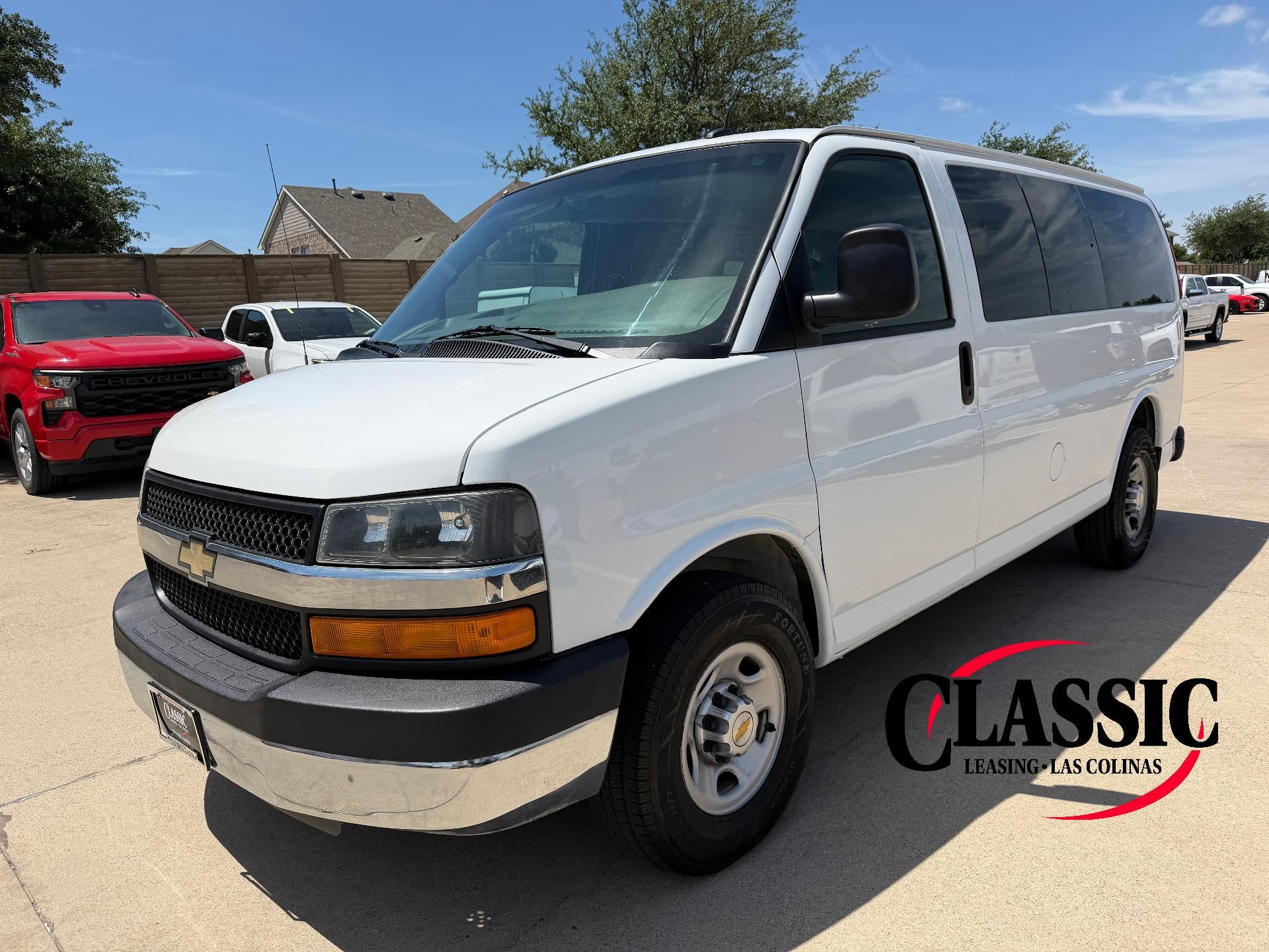 2015 Chevrolet Express Passenger 2500 Regular Wheelbase Rear-Wheel Drive 1LT in Summit White — front three-quarter view