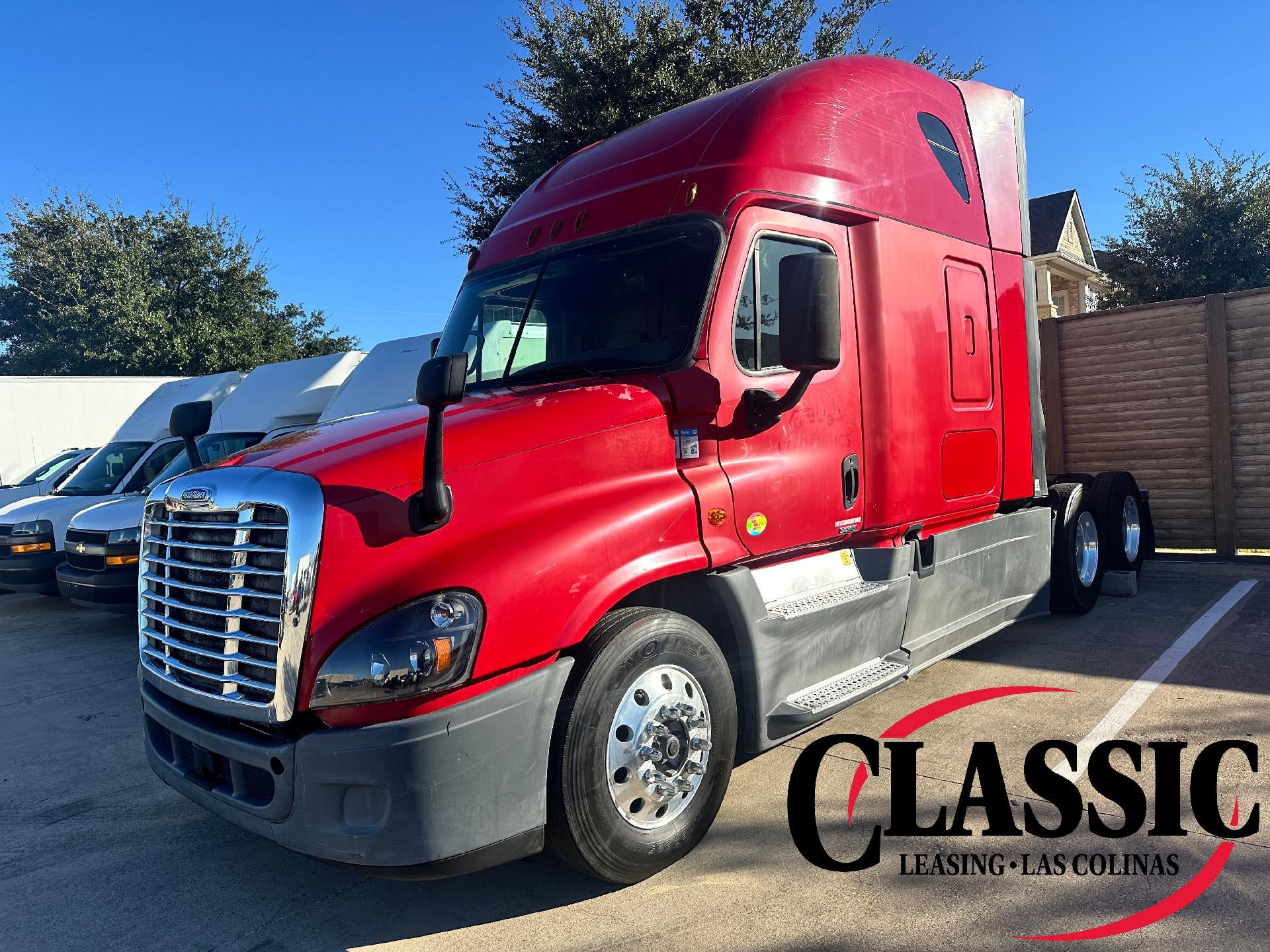 2015 Freightliner CASC Base in Red — front three-quarter view