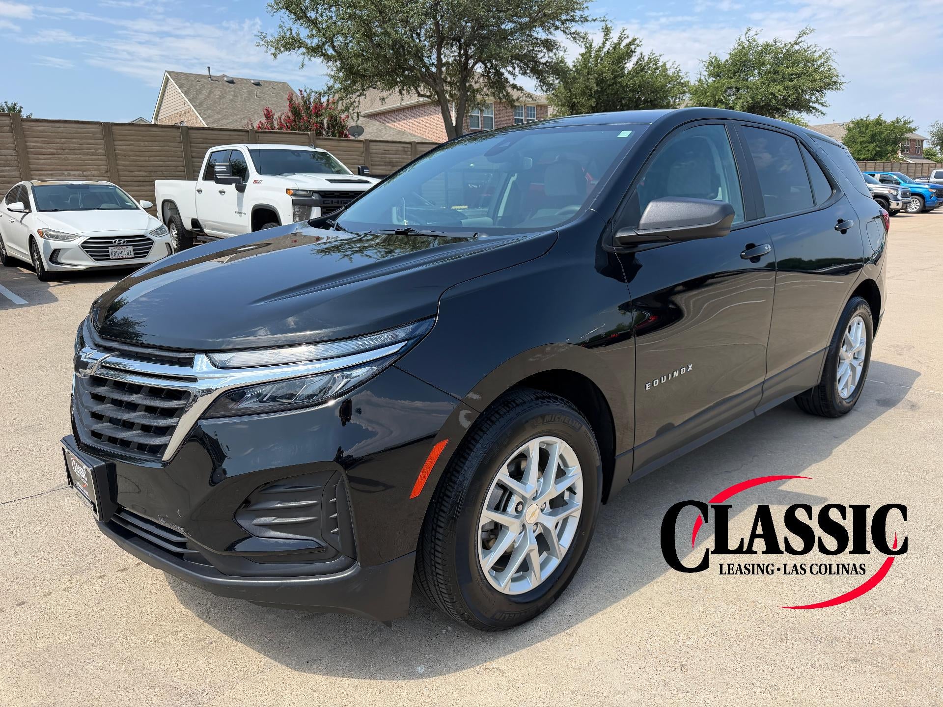 2023 Chevrolet Equinox FWD 4dr LS w/1LS in Mosaic Black Metallic — front three-quarter view
