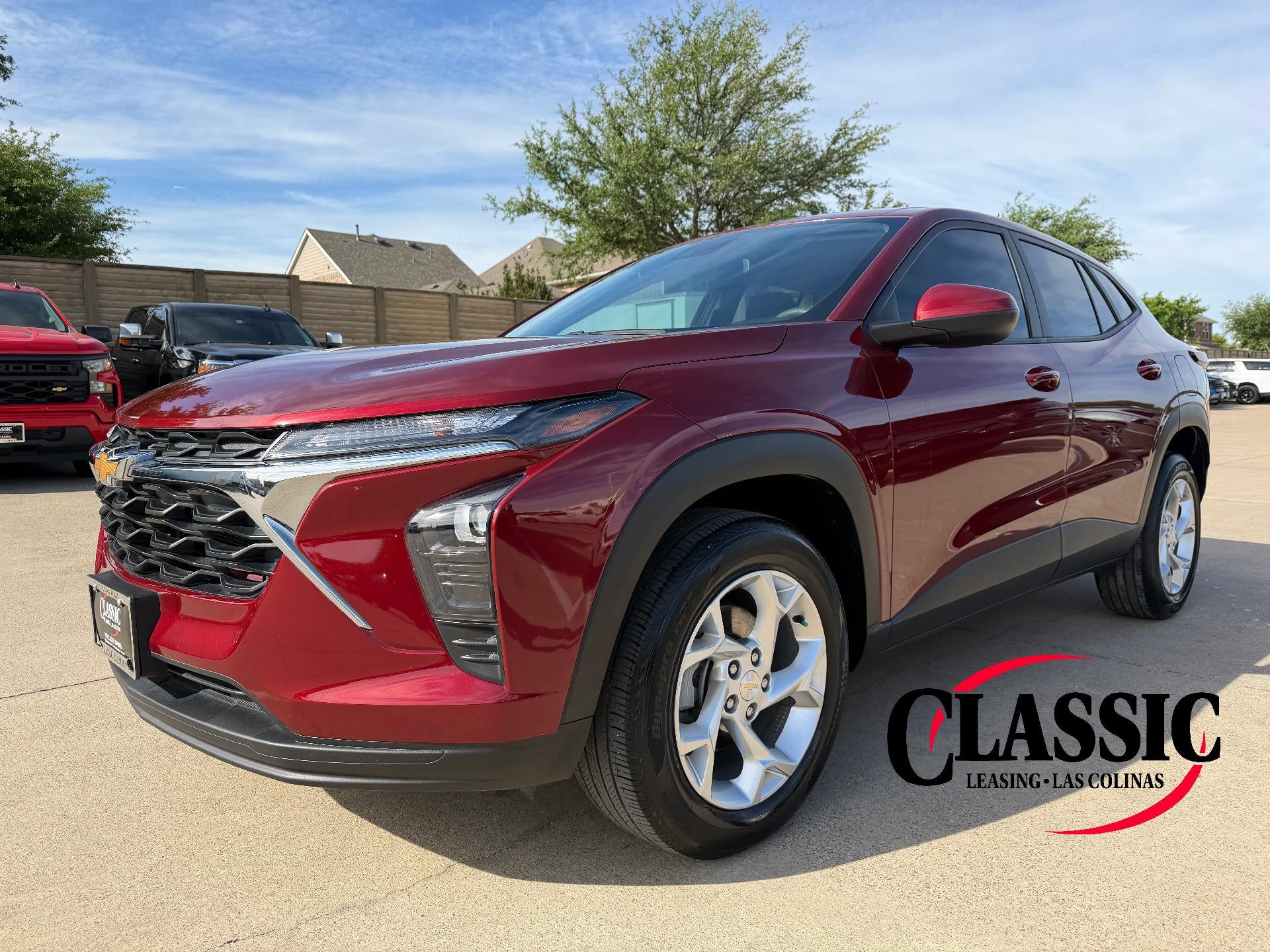 2024 Chevrolet Trax FWD 4dr LS in Crimson Metallic — front three-quarter view