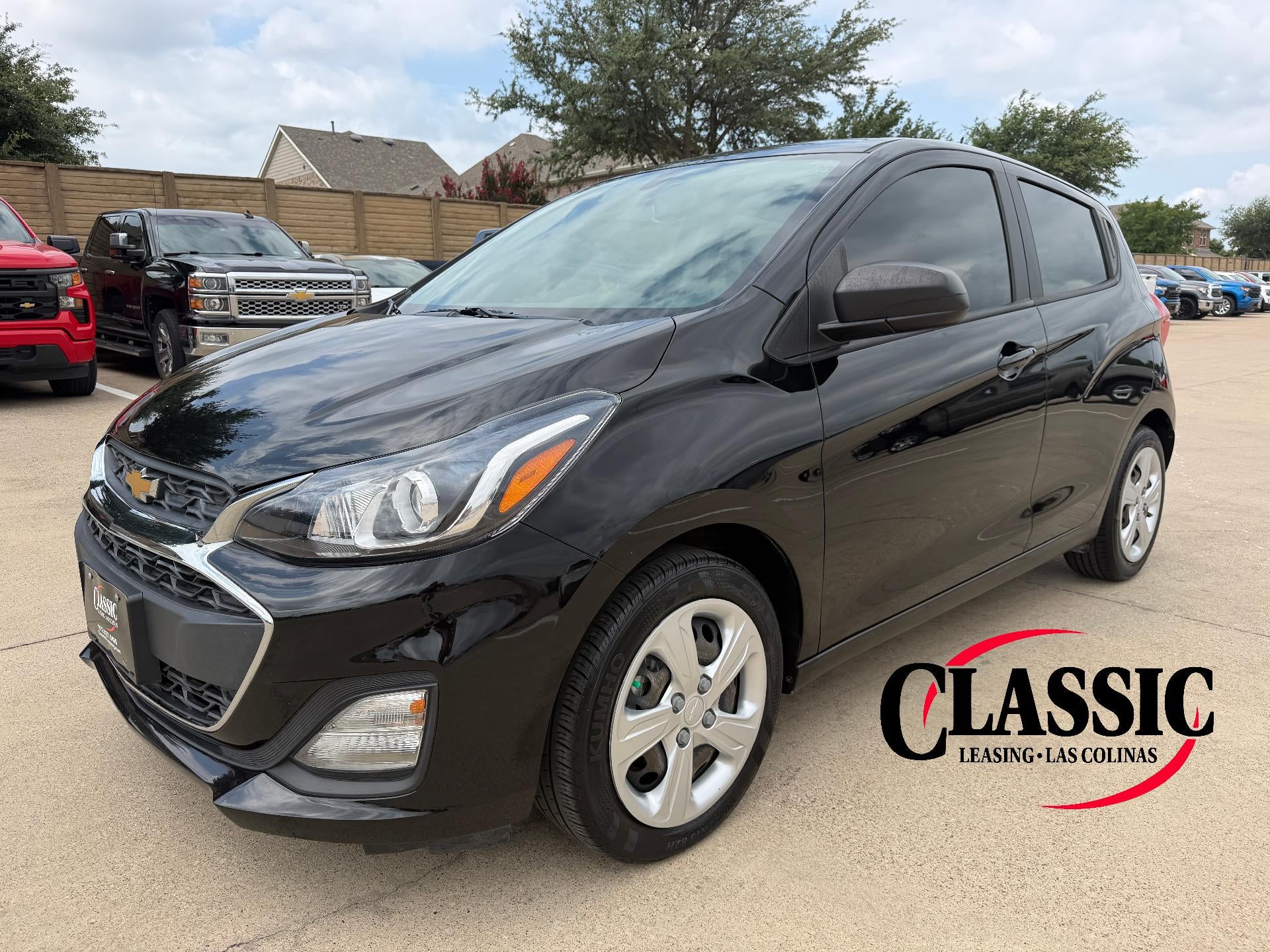 2022 Chevrolet Spark 4dr HB CVT LS in Mosaic Black — front three-quarter view